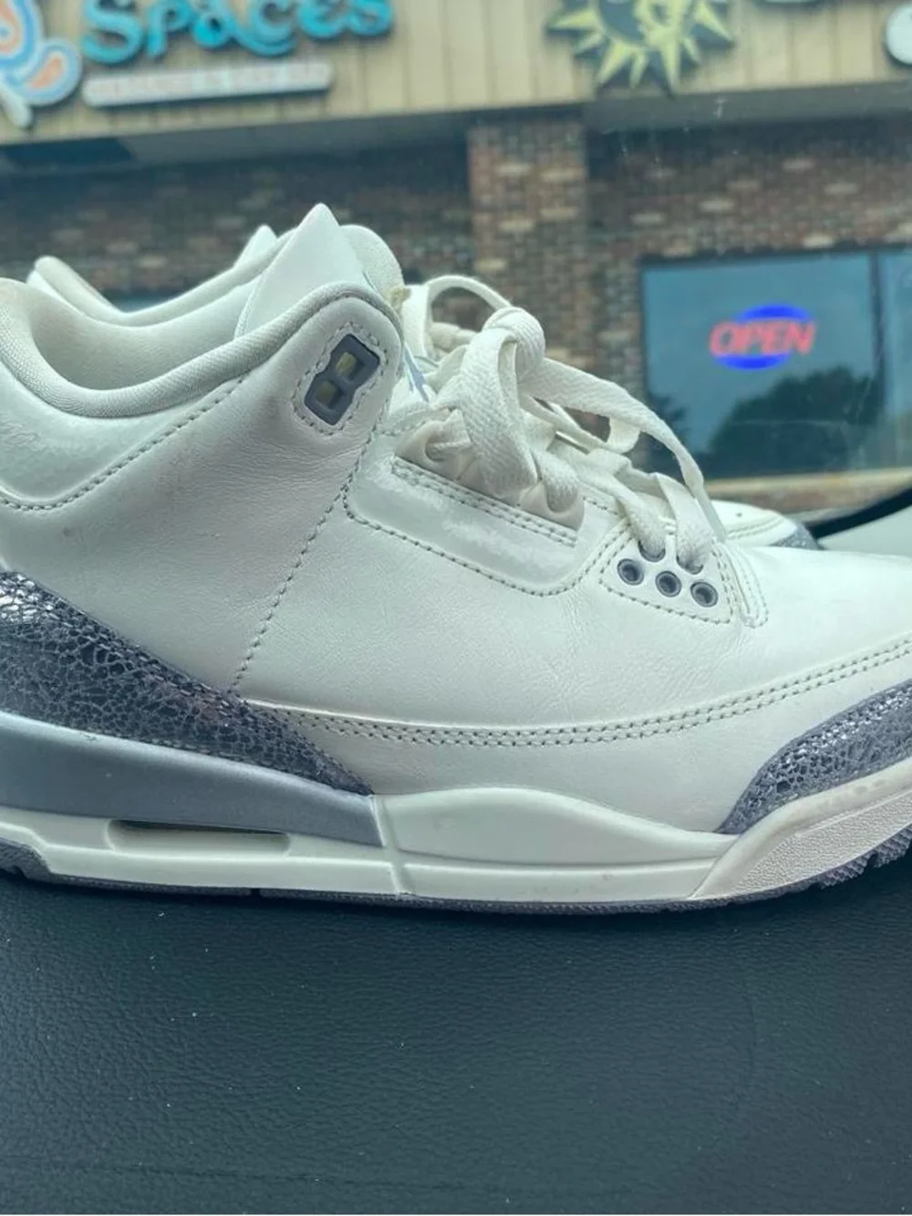 Jordan White Basketball Sneakers with Light Blue Trim